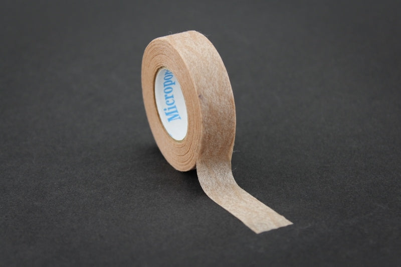 Does the 3M 15330 Micropore Tape leave any sticky residue behind?
